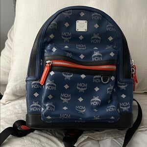 MCM Blue Monogram Leather Backpack with Orange Zipper